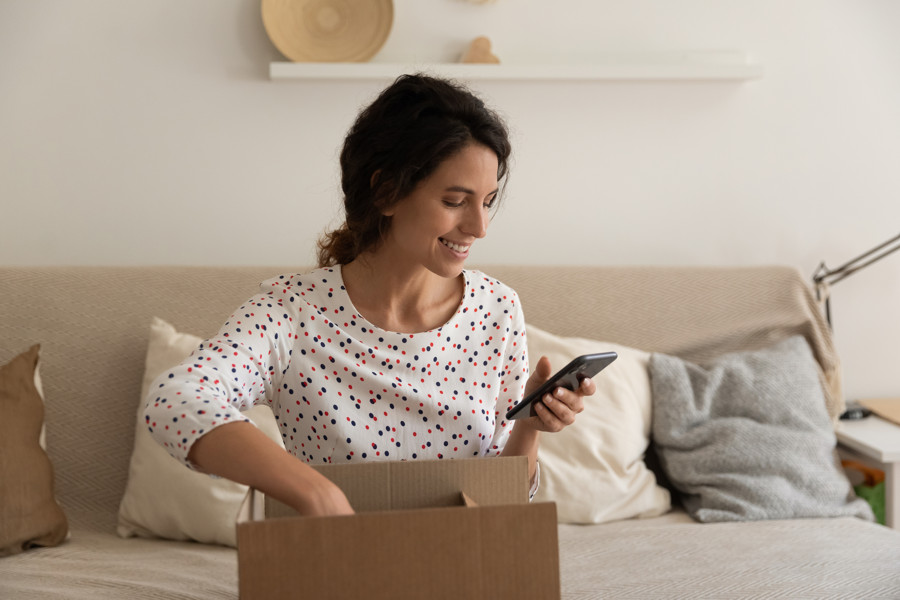 Woman simplifying her household with cleaner products